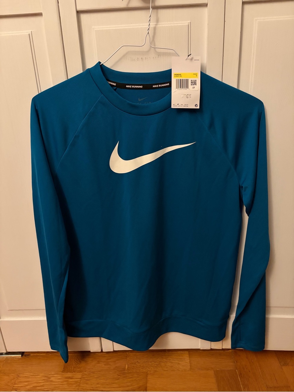 Nike Teal Long-Sleeve Performance Top with White Swoosh